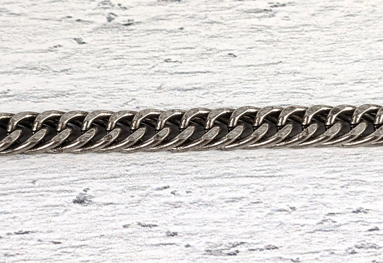 Double curb chain