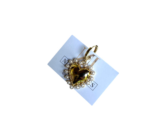 Golden heart charm